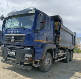 ბობკატები მიწის, ქვიშის, ნარჩენებისა და სამშენებლო მასალების გადასატანად
